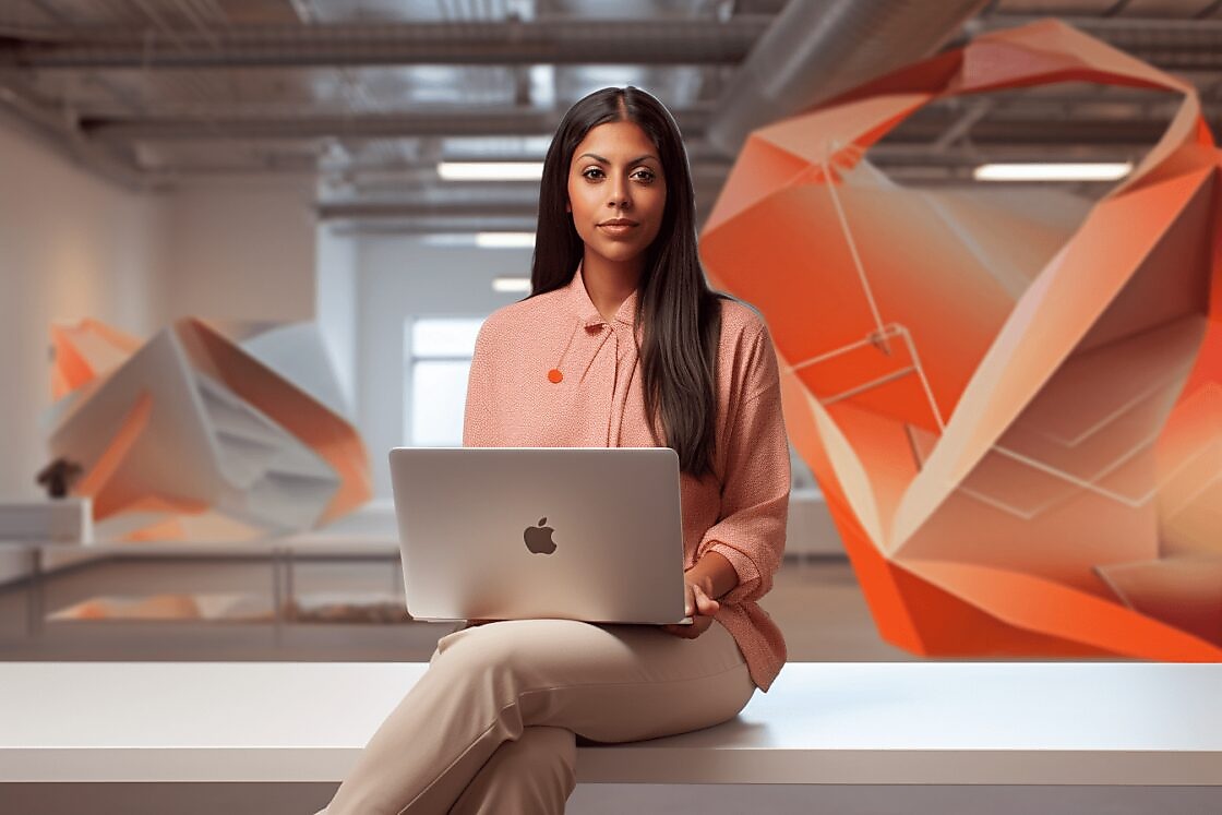 woman with laptop in empty office